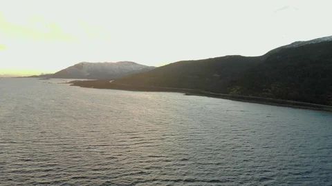 Aerial fly over tilted shot with view of islands and coastal road in northen 스톡 동영상 126540781