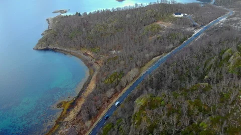 Aerial fly over tilted shot with view of islands and coastal road in northen Video stock 126541768