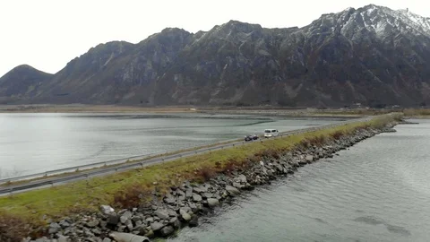 Aerial fly over tilted shot with view of islands and coastal road in northen 動画素材 126542212