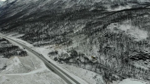 Aerial fly over tilted shot with view of islands and coastal road in northen Vidéo 126544939