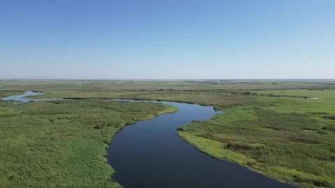 Aerial fly over view of the mighty Zambezi River flowing down to the Victoria Stock Footage 244790380
