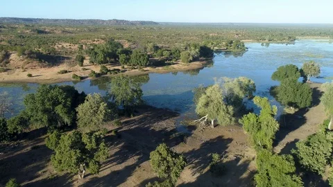 Aerial fly over view of a river in Gonarezhou National Park, Zimbabwe Stock Footage 112870127