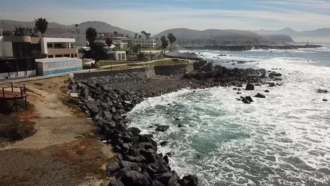 Aerial &amp; fly over view of some artificial rocky seashore of Baja California Stock-Footage 112448957