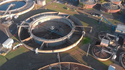 Aerial: Fly-over of a waste water treatment plant Vídeos de archivo 128009812