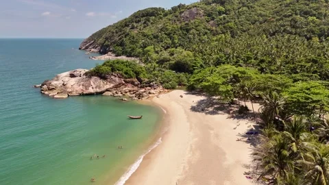Aerial Fly Past Granite Rocks and Longtail Boat, Haad Sadet Koh Phangan Stock Footage 347981953