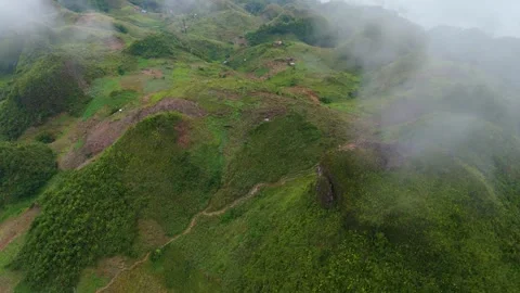 Aerial Fly Through Clouds Above Osmeña Peak Mountain Trails and Shelters Cebu Video stock 332604952