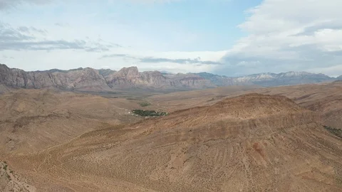 Aerial Fly Through of Desert Mountain, Red Rock Canyon, Blue Diamond Background Stock Footage 116657789