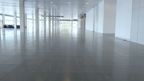 Aerial fly-through inside huge deserted office building Stock Footage 107307219