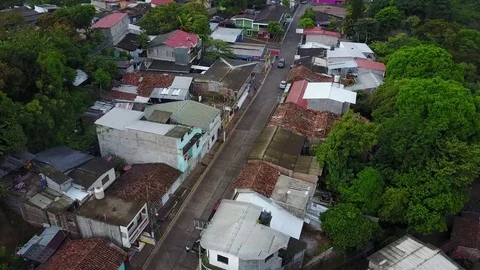 Aerial fly-through of small town street in El Salvador Stock-Footage 76670922