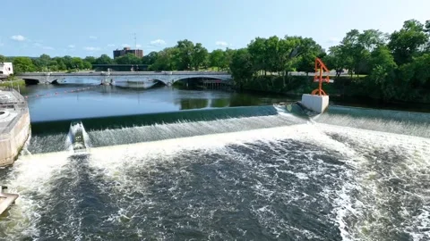 Aerial Fly Through South Bend Riverfront Waterfall and Bridges Stock Footage 283495757