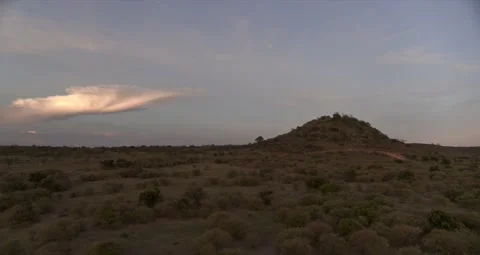 Aerial Fly through at sunset around the Kenyan Maasai Mara Video stock 151086335