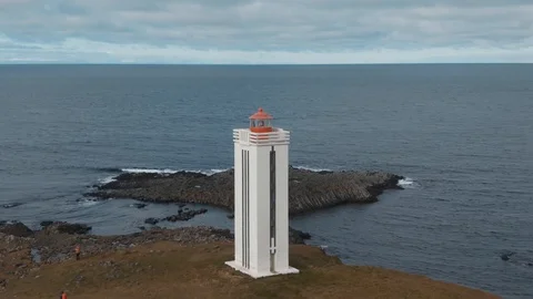 Aerial fly through view of a lighthouse by the sea in West Iceland Stock Footage 116545366