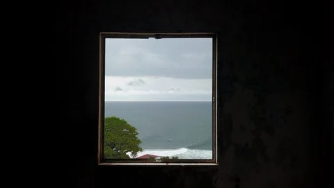 Aerial Fly Through Window Opening of Abandoned Building to Ocean Horizon Stock-Footage 101622875