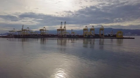 Aerial fly towards the cranes at container terminal. Видео 121104793