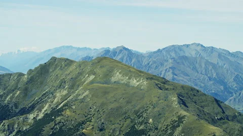Aerial fly towards round smooth hill Stock Footage 159036865