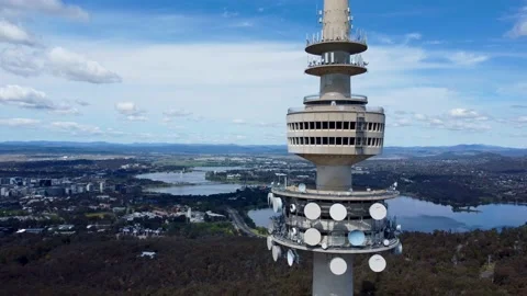 Aerial flyby of Telstra Tower in Canberra, the capital of Australia, showing a Stock Footage 227278015