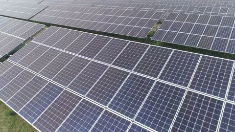 Aerial. Flying above solar panel generating plant. Stock Footage 136450295