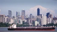 Aerial: Flying Alongside The Vancouver City Skyline, Canada Stock Footage