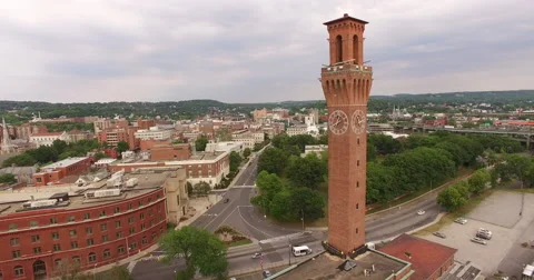 Aerial flying around a clock tower in 4K Stock Footage 64832596