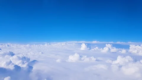 Aerial Flying Avobe Clouds moving fluffy moving softly clear blue sky. 4K Vídeo Stock 128212124