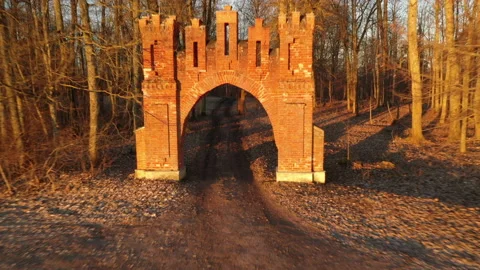 Aerial: flying backward through the medieval gate Stock Footage 175175447