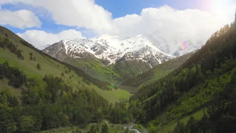 Aerial flying between mountains in the mountain canyon Video stock 155987404