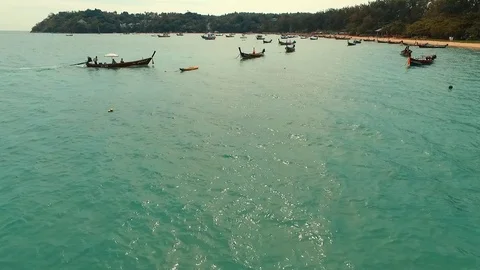 Aerial: Flying close to the long tail boat. Stock Footage 69903956