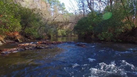 Aerial Flying Down Mountain Stream, 4K Stock Footage 71101094