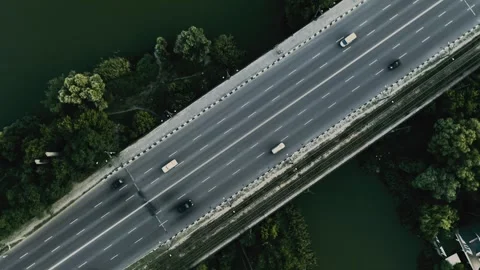 Aerial Flying Drone High View of Road with Driving Cars Crossing River 스톡 동영상 341569545