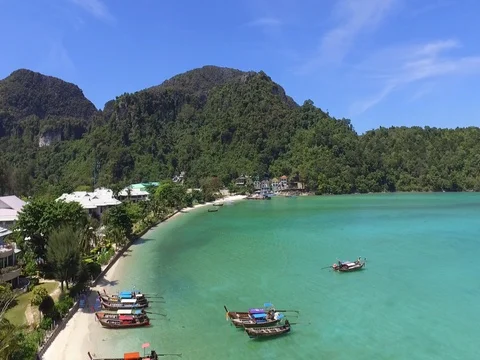 Aerial flying forward long tail boat, island view in Thailand Stock Footage 72707098