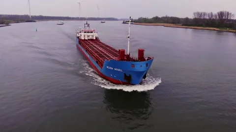 Aerial Flying In Front Of Forward Bow Of Wilson Mosel Ship Along Oude Maas Stock-Footage 179961152