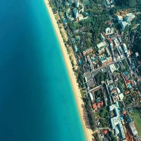 Aerial: Flying high above the beach. Stock Footage 69704089