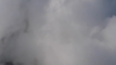 Aerial flying into large puffy clouds Stock Footage 240416969