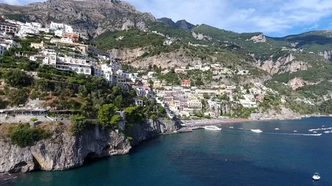 Aerial flying low past cliffs towards Amalfi a town in province of Salerno 4k Stock Footage 72571468
