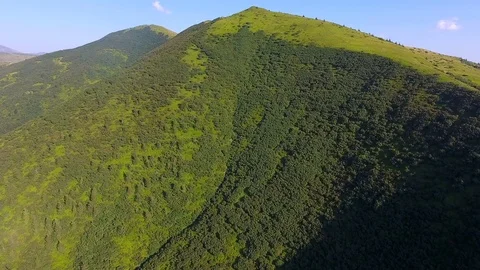 Aerial flying over a amazing mountain forests Stock Footage