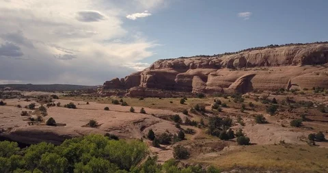 Aerial flying over dramatic slickrock sandstone near Moab, Utah Stock Footage 117864837