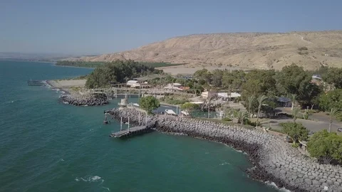 AERIAL FLYING OVER EIN GEV KIBBUTZ SEA OF GALILEE Stock Footage 94052208
