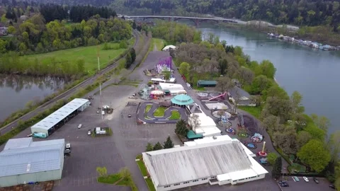 Aerial flying over empty and closed amusement park during covid-19 pandemic. Stockbeeldmateriaal 137547923
