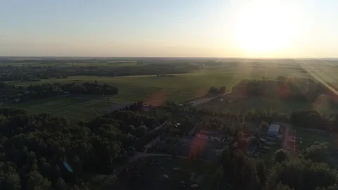 Aerial flying over forests and fields in sunny summer weather Stock Footage 101979526
