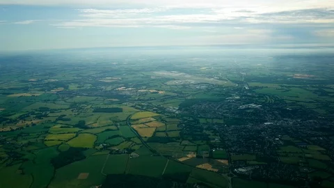 Aerial flying over green fields Stock Footage 97028351