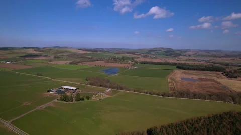 Aerial - Flying Over Green Fields In United Kingdom, Farming Region 4K Stock Footage 172540342
