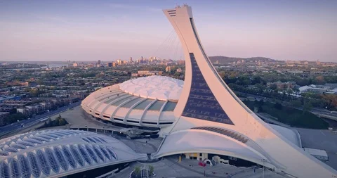 AERIAL: Flying over the Montreal Olympic Stadium at sunrise, Quebec, Canada Stock Footage