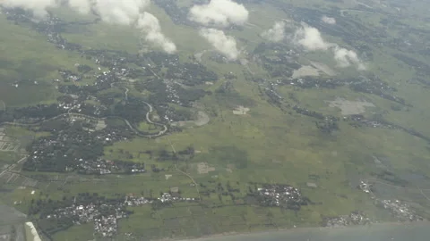 Aerial Flying Over North Sulawesi - River Green Rice Fields Clouds Village Stock Footage 202492297