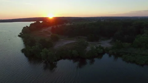 AERIAL: Flying over the pine tree in the forest. Sunrise. Stock Footage 53615053