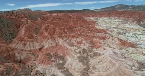 Aerial flying over red eroded dry mountainous landscape 스톡 동영상 103498173