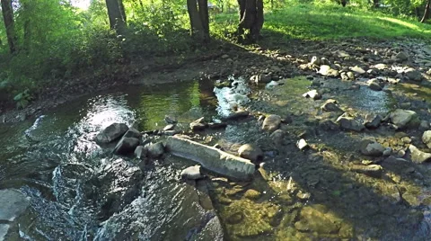 AERIAL: Flying over river in the forest mountain Video stock 54142283