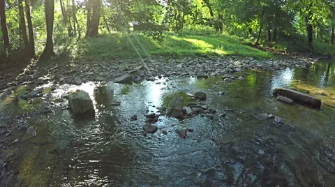 AERIAL: Flying over river in the forest mountain Video stock 54143009