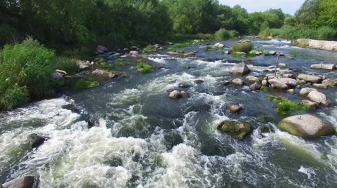Aerial: flying over river rapids Stock Footage 54215432