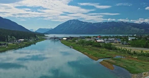 AERIAL: flying over  river in remote countryside. carcross Yukon Territory, Stock Footage 78954158