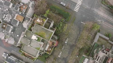 Aerial flying over the rooftop of a high-rise building. Video stock 150415817